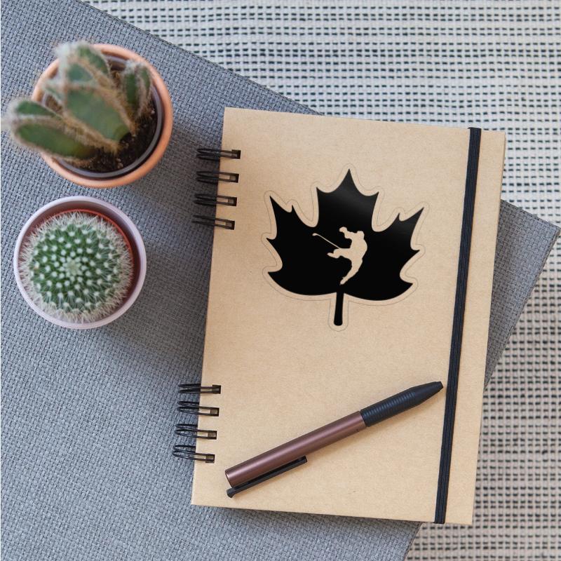 Canada maple leaf with carved ice hockey player